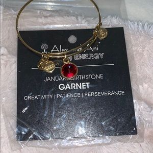 Barely used Garnet Alex and Ani in gold tone.